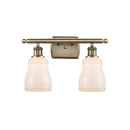 Ellery Bath Vanity Light shown in the Antique Brass finish with a White shade