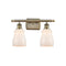 Ellery Bath Vanity Light shown in the Antique Brass finish with a White shade