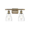 Ellery Bath Vanity Light shown in the Antique Brass finish with a Seedy shade