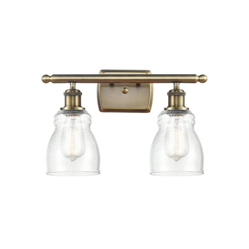 Ellery Bath Vanity Light shown in the Antique Brass finish with a Seedy shade