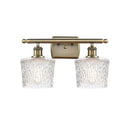 Niagra Bath Vanity Light shown in the Antique Brass finish with a Clear shade