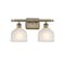 Dayton Bath Vanity Light shown in the Antique Brass finish with a White shade