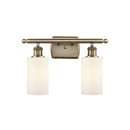 Clymer Bath Vanity Light shown in the Antique Brass finish with a Matte White shade