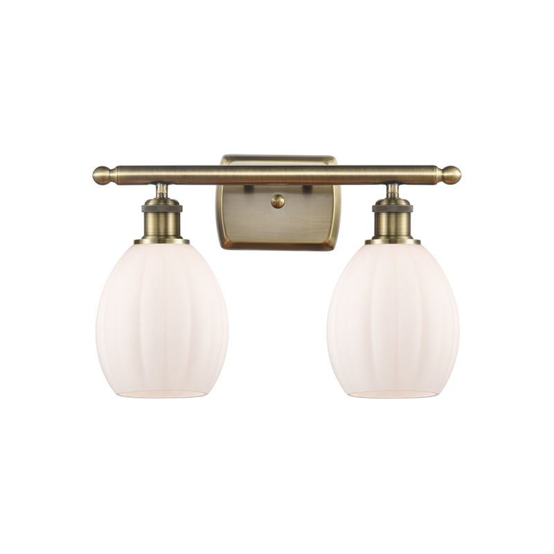 Eaton Bath Vanity Light shown in the Antique Brass finish with a Matte White shade