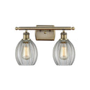 Eaton Bath Vanity Light shown in the Antique Brass finish with a Clear shade