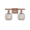 Belfast Bath Vanity Light shown in the Antique Copper finish with a Clear Crackle shade