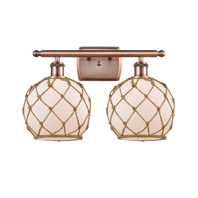 Farmhouse Rope Bath Vanity Light shown in the Antique Copper finish with a White Glass with Brown Rope shade