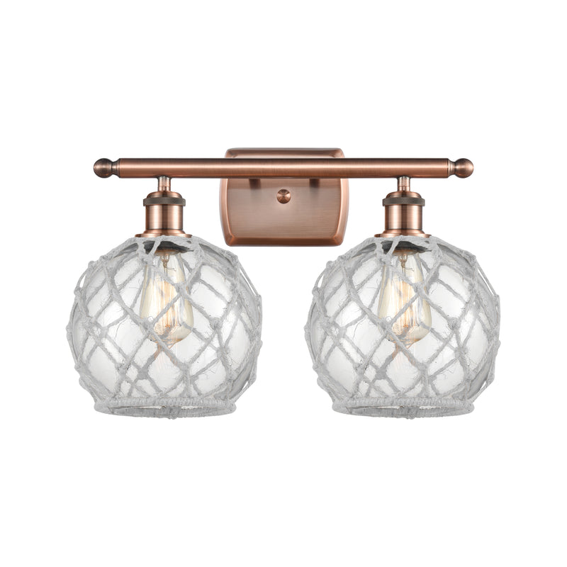 Farmhouse Rope Bath Vanity Light shown in the Antique Copper finish with a Clear Glass with White Rope shade