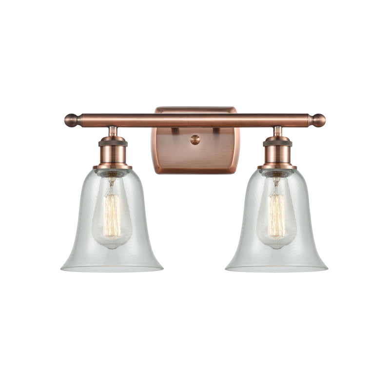 Hanover Bath Vanity Light shown in the Antique Copper finish with a Fishnet shade