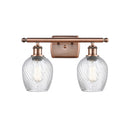 Salina Bath Vanity Light shown in the Antique Copper finish with a Clear Spiral Fluted shade