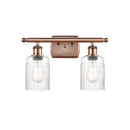 Hadley Bath Vanity Light shown in the Antique Copper finish with a Clear shade