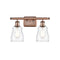 Ellery Bath Vanity Light shown in the Antique Copper finish with a Clear shade