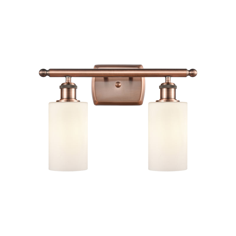 Clymer Bath Vanity Light shown in the Antique Copper finish with a Matte White shade