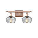 Fenton Bath Vanity Light shown in the Antique Copper finish with a Clear shade