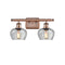 Fenton Bath Vanity Light shown in the Antique Copper finish with a Clear shade