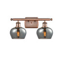Fenton Bath Vanity Light shown in the Antique Copper finish with a Plated Smoke shade