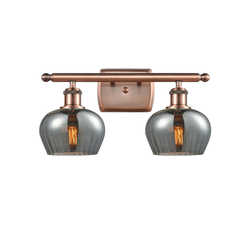 Fenton Bath Vanity Light shown in the Antique Copper finish with a Plated Smoke shade