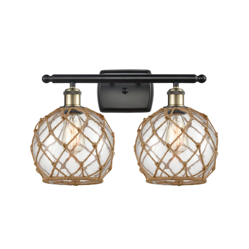Farmhouse Rope Bath Vanity Light shown in the Black Antique Brass finish with a Clear Glass with Brown Rope shade