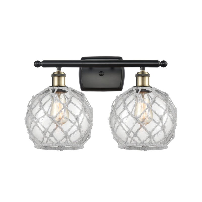 Farmhouse Rope Bath Vanity Light shown in the Black Antique Brass finish with a Clear Glass with White Rope shade