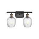 Salina Bath Vanity Light shown in the Black Antique Brass finish with a Clear Spiral Fluted shade