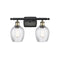 Salina Bath Vanity Light shown in the Black Antique Brass finish with a Clear Spiral Fluted shade