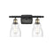 Ellery Bath Vanity Light shown in the Black Antique Brass finish with a Seedy shade