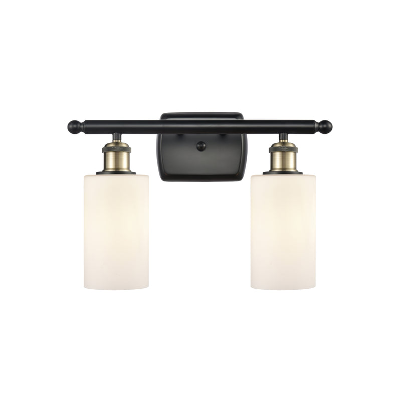 Clymer Bath Vanity Light shown in the Black Antique Brass finish with a Matte White shade