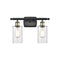 Clymer Bath Vanity Light shown in the Black Antique Brass finish with a Clear shade