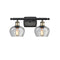 Fenton Bath Vanity Light shown in the Black Antique Brass finish with a Clear shade