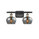 Fenton Bath Vanity Light shown in the Black Antique Brass finish with a Plated Smoke shade