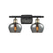 Fenton Bath Vanity Light shown in the Black Antique Brass finish with a Plated Smoke shade