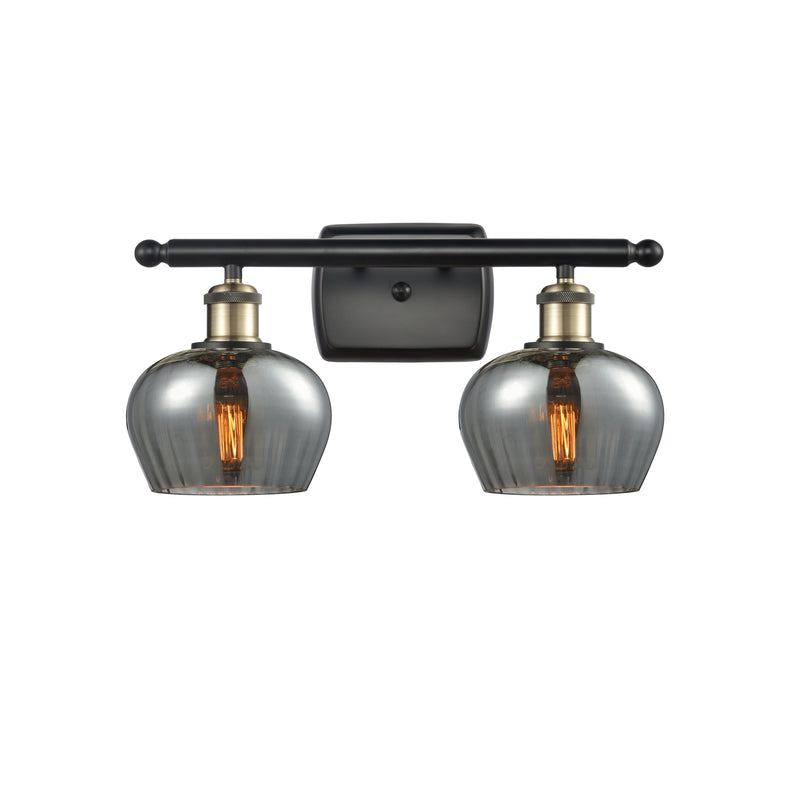 Fenton Bath Vanity Light shown in the Black Antique Brass finish with a Plated Smoke shade