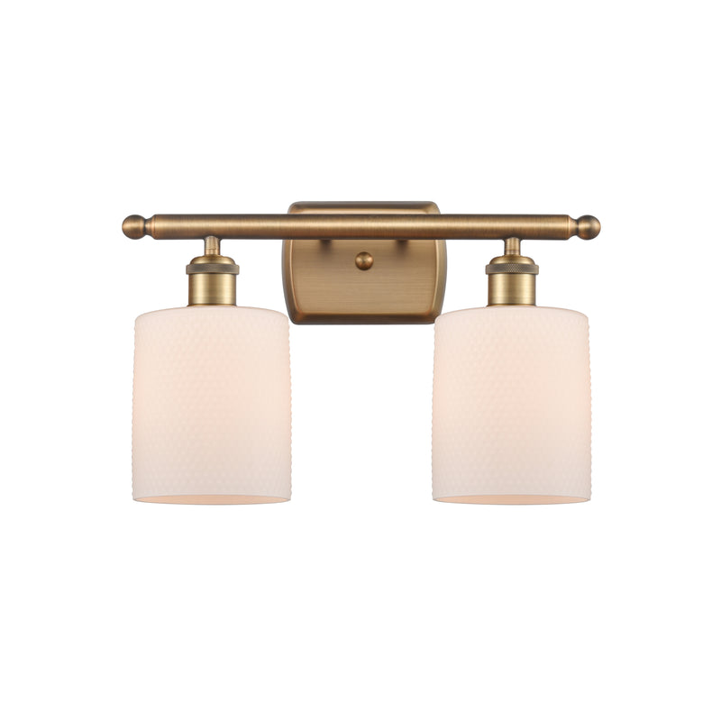 Cobbleskill Bath Vanity Light shown in the Brushed Brass finish with a Matte White shade