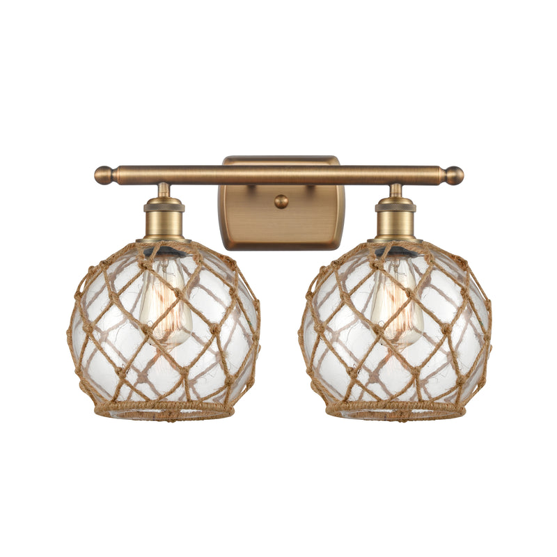 Farmhouse Rope Bath Vanity Light shown in the Brushed Brass finish with a Clear Glass with Brown Rope shade