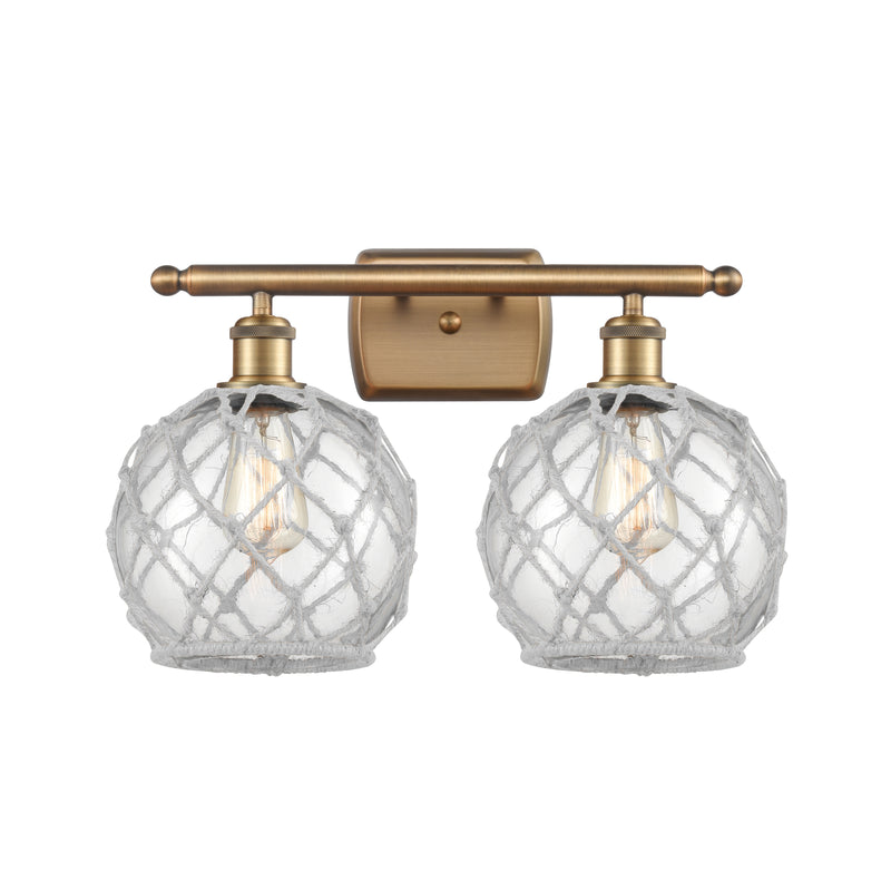 Farmhouse Rope Bath Vanity Light shown in the Brushed Brass finish with a Clear Glass with White Rope shade