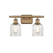 Caledonia Bath Vanity Light shown in the Brushed Brass finish with a Mica shade