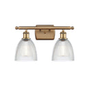 Castile Bath Vanity Light shown in the Brushed Brass finish with a Clear shade