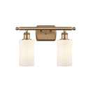 Clymer Bath Vanity Light shown in the Brushed Brass finish with a Matte White shade