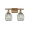 Eaton Bath Vanity Light shown in the Brushed Brass finish with a Clear shade