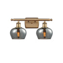 Fenton Bath Vanity Light shown in the Brushed Brass finish with a Plated Smoke shade