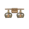 Fenton Bath Vanity Light shown in the Brushed Brass finish with a Mercury shade