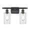 Clymer Bath Vanity Light shown in the Matte Black finish with a Clear shade