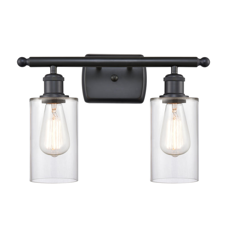 Clymer Bath Vanity Light shown in the Matte Black finish with a Clear shade