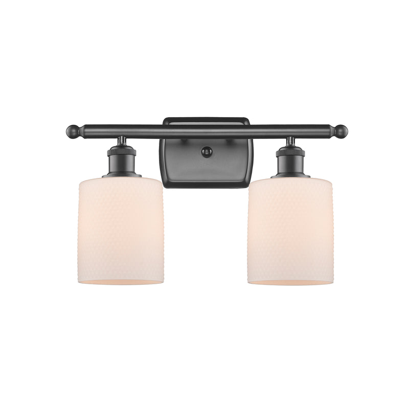 Cobbleskill Bath Vanity Light shown in the Oil Rubbed Bronze finish with a Matte White shade