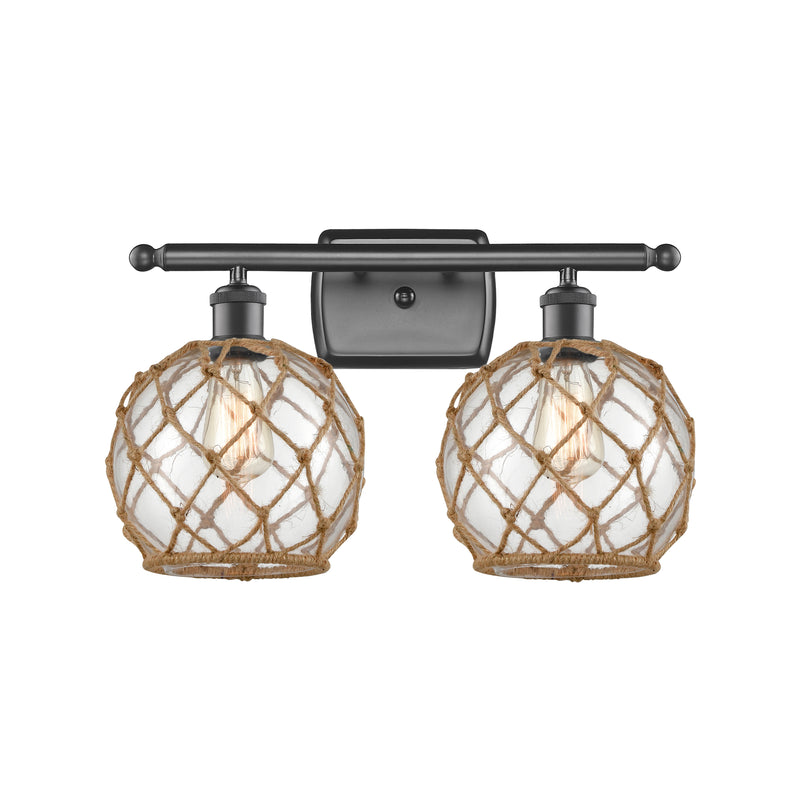 Farmhouse Rope Bath Vanity Light shown in the Oil Rubbed Bronze finish with a Clear Glass with Brown Rope shade