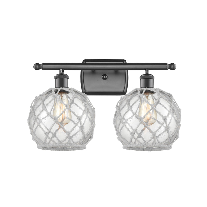 Farmhouse Rope Bath Vanity Light shown in the Oil Rubbed Bronze finish with a Clear Glass with White Rope shade