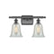 Hanover Bath Vanity Light shown in the Oil Rubbed Bronze finish with a Mouchette shade