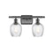 Salina Bath Vanity Light shown in the Oil Rubbed Bronze finish with a Clear Spiral Fluted shade