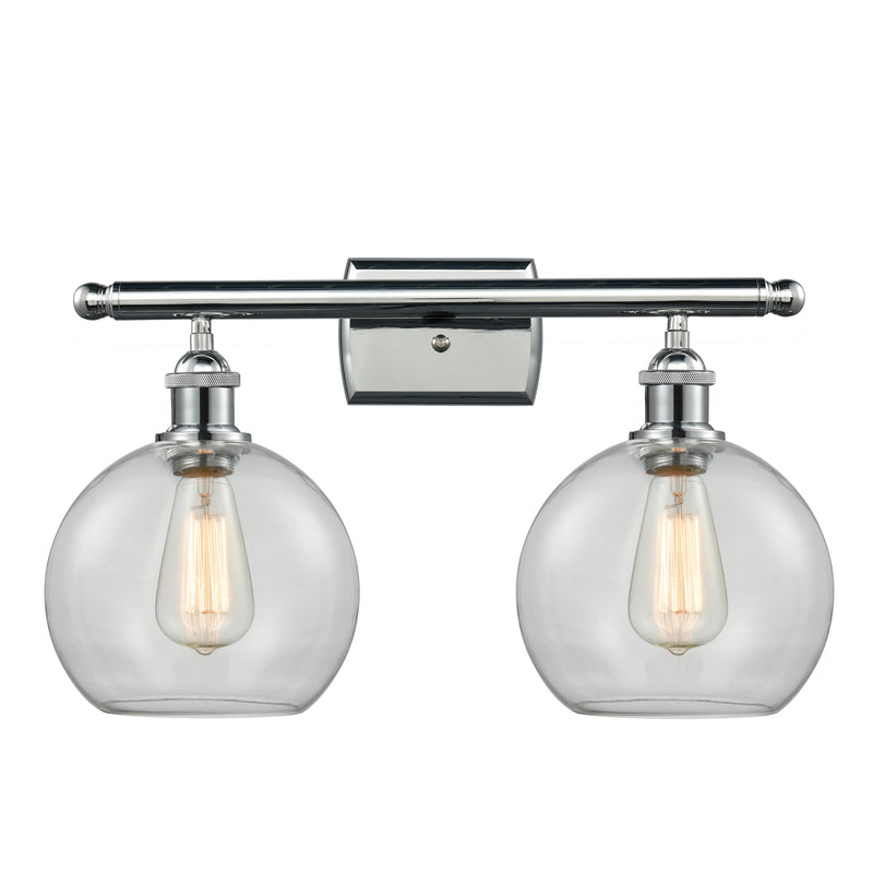 Athens Bath Vanity Light shown in the Polished Chrome finish with a Clear shade