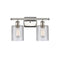 Cobbleskill Bath Vanity Light shown in the Polished Nickel finish with a Clear shade